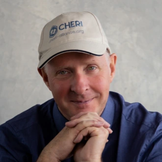 Mike Halsall wearing a CHERI cap
