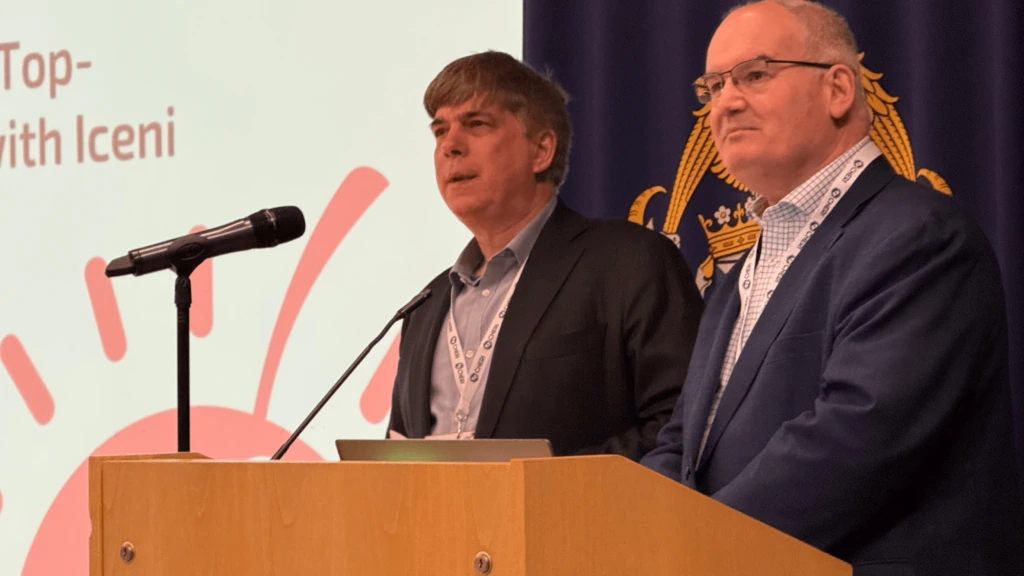 Gavin Ferris and Haydn Povey on stage at the CHERI Blossoms 2025 conference