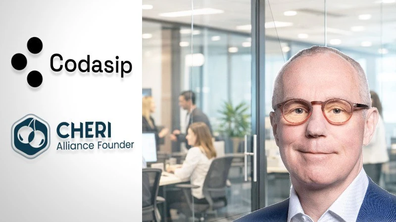 Ron Black in an office with the Codasip and CHERI Alliance member logos